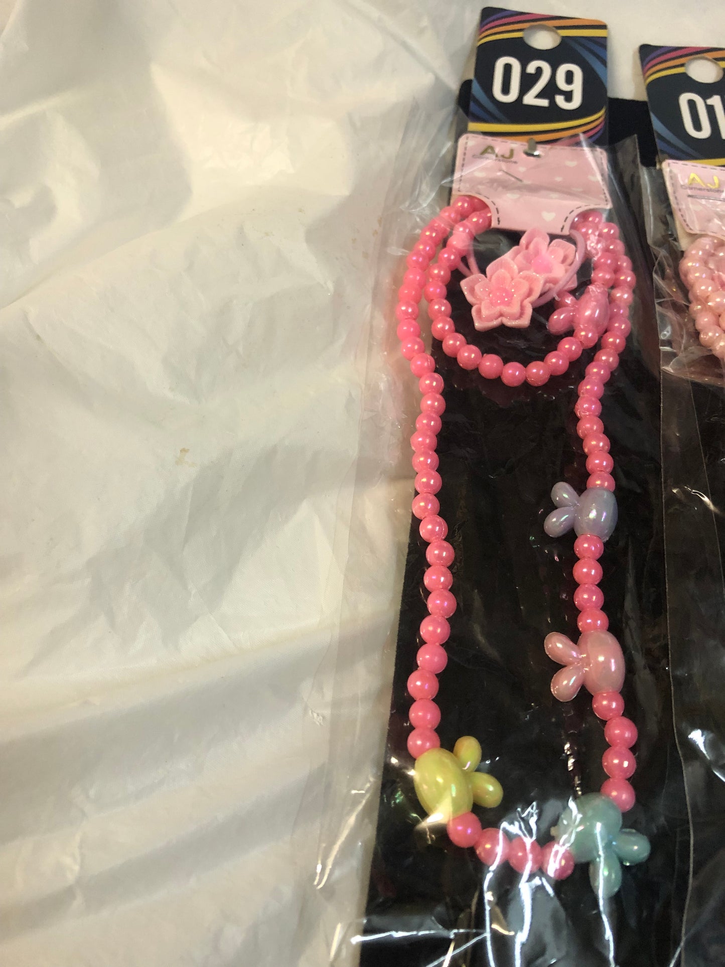 Girls Three Piece Set. "New Arrival" Necklace,Hair Ties, Braclet 6 Different Colors. Great For Easter. Order Now!